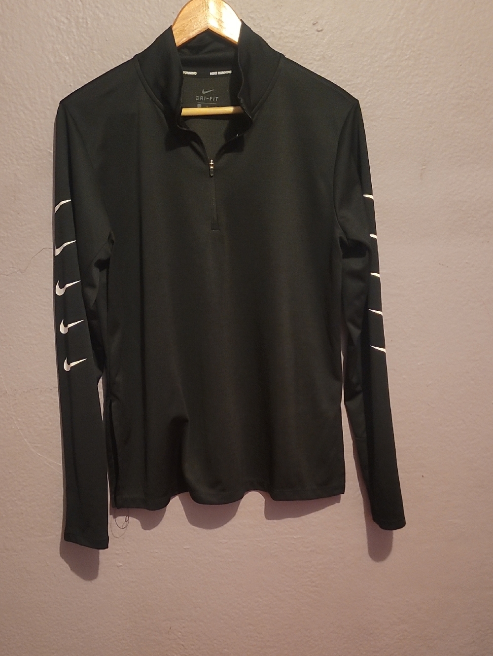 Nike Black Long-Sleeve Quarter-Zip Top with White Swoosh Sleeve Accents
